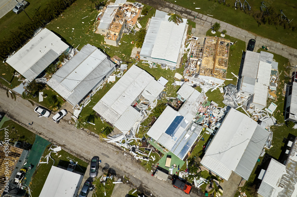 Damaged homes and businesses by Hurricane Ian